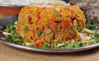 Kathmandu kukhura pulao + mix vegetable raita (1/2)